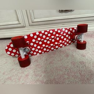 Red polka dot penny board